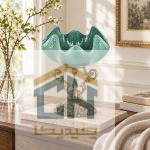 میوه خوری فیروزه ای پایه برنز در چیدمان روی کنسول