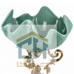 جزئیات لبه موج دار میوه خوری فیروزه ای و بخش بالایی پایه برنزی