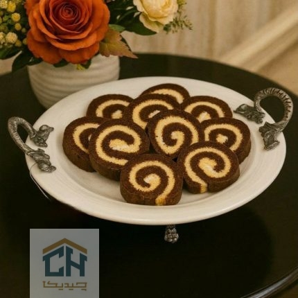 شیرینی خوری گرد دسته پیوتر با چیدمان رولت شکلاتی