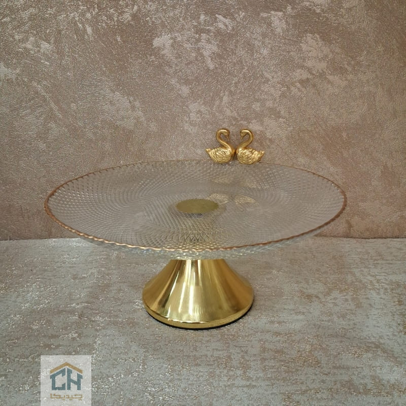 شیرینی خوری بلور متوسط پایه فلزی طرح پیکسل مدل 302 (1) ظرف شیرینی خوری پایه دار با پایه طلایی و مجسمه قو (1)