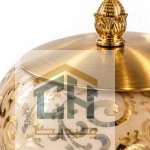 جزئیات درب طلایی و نقوش بدنه بلوری شکلات خوری الیسا
