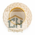 نمای بالا از دهانه گلدان کرم با حلقه طلایی و بدنه بافت دار