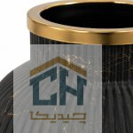 نمای نزدیک حلقه طلایی و رگه های طلایی روی بدنه مشکی مات